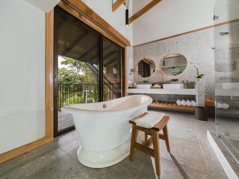 Rainforest King Bed | Bathroom | Shower, designer toiletries, hair dryer, bathrobes