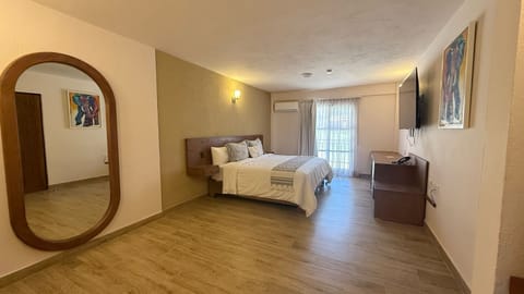 Triple Room | Desk, laptop workspace, blackout drapes, iron/ironing board