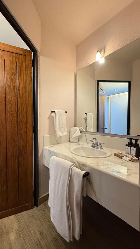 Shower, towels, soap, shampoo