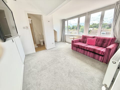 Family Quadruple Room | In-room safe, desk, laptop workspace, iron/ironing board