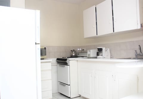 Apartment, 1 Bedroom | Private kitchen | Fridge, microwave, oven, stovetop