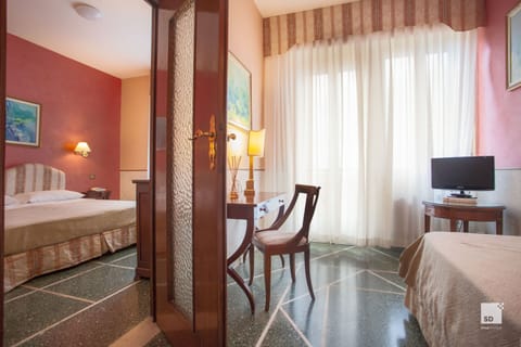 Standard Triple Room | Minibar, blackout drapes, free WiFi, bed sheets