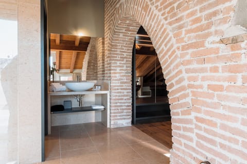 Deluxe Suite, Balcony, Canal View | In-room safe, desk, blackout drapes, soundproofing