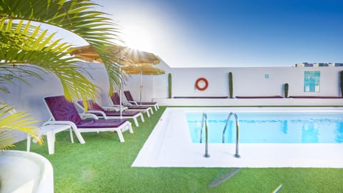 Outdoor pool, open 10:00 AM to 6:30 PM, sun loungers