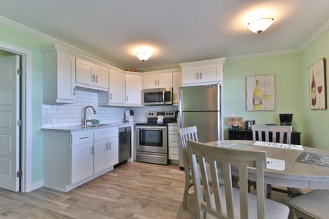 Tradewinds Bayfront 1 Bedroom | Private kitchen | Full-size fridge, microwave, oven, stovetop