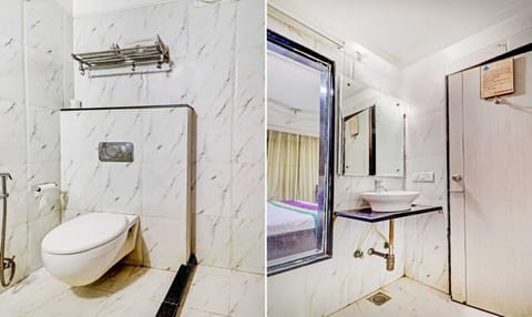 Executive Room | Bathroom | Shower, free toiletries, towels