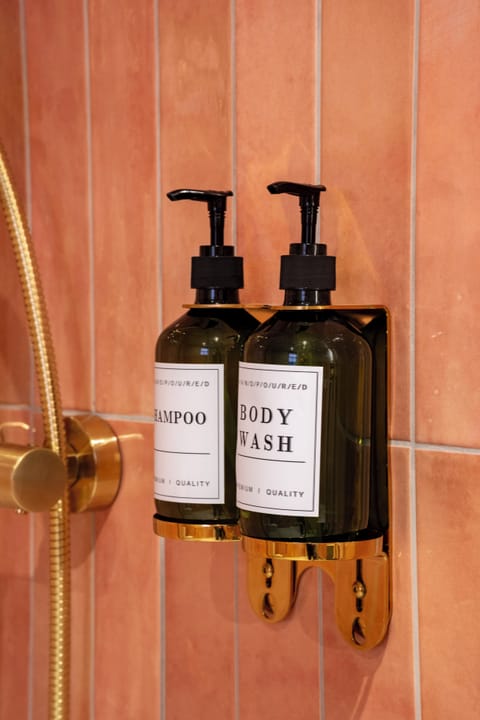 Shower, hair dryer, heated floors, towels