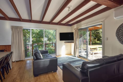 Eucalypt Cottages | Living area | 42-inch flat-screen TV with digital channels