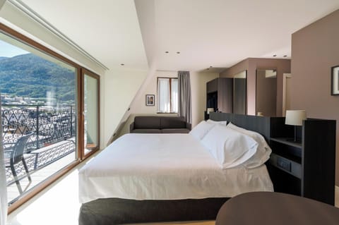 Deluxe Double Room, Balcony, City View | In-room safe, soundproofing, iron/ironing board, free WiFi