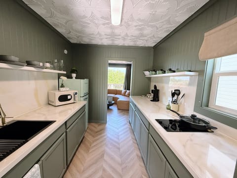 Elite Cabin, Lake View | Private kitchen | Microwave, stovetop, coffee/tea maker, cookware/dishes/utensils
