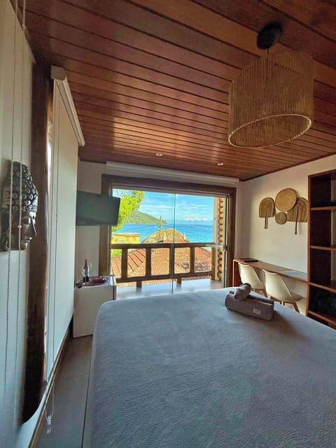 Comfort Suite, Beach View | 1 bedroom, in-room safe, desk, laptop workspace
