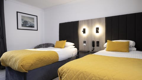 Standard Twin Room | Blackout drapes, iron/ironing board, free WiFi, bed sheets