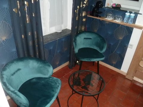 Standard Room | Living area | 72-inch Smart TV with cable channels