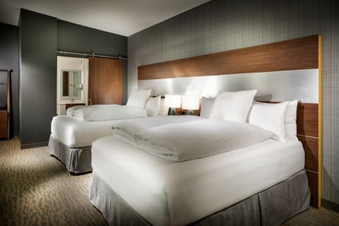 Premium bedding, pillowtop beds, desk, laptop workspace