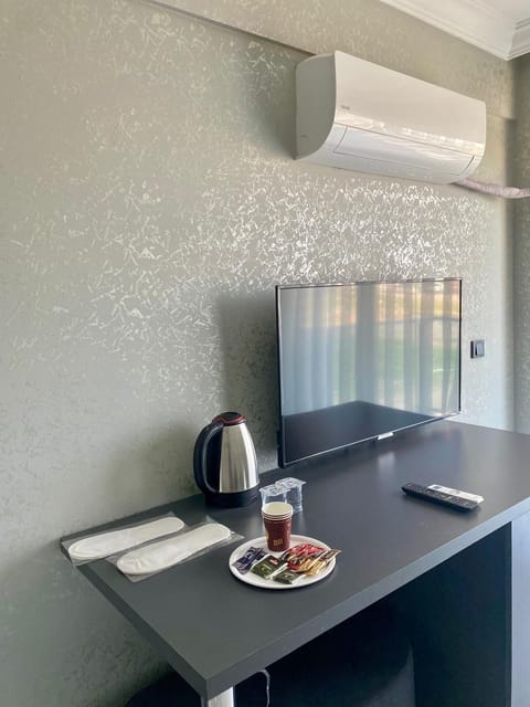 Classic Condo, Balcony | Premium bedding, desk, free WiFi, bed sheets