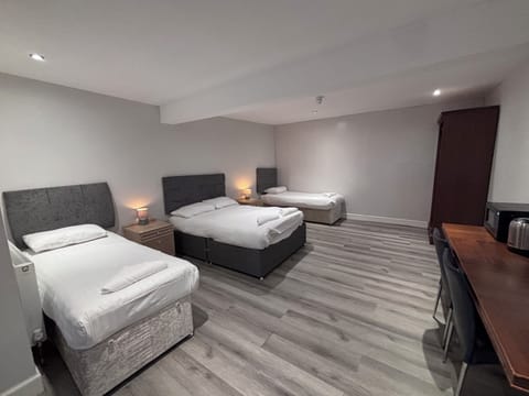 Basic Quadruple Room | Iron/ironing board, free WiFi