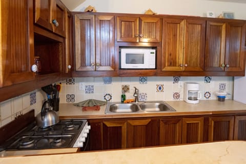 Standard Apartment, Ocean View | Private kitchen | Fridge, microwave, coffee/tea maker, cookware/dishes/utensils