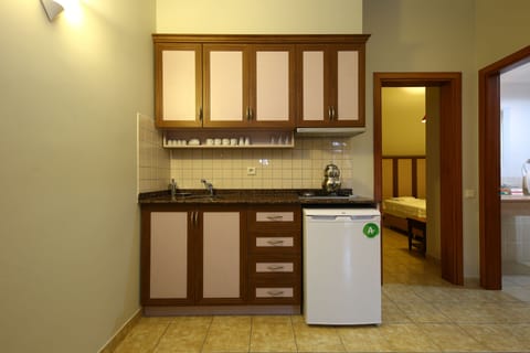 Apartment | Private kitchen | Fridge, stovetop, coffee/tea maker, highchair