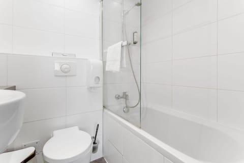 Eco-friendly toiletries, hair dryer, towels