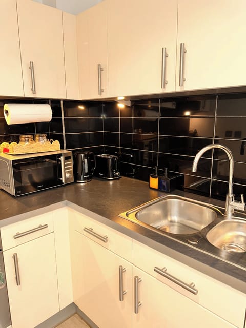 Apartment | Private kitchen | Fridge, microwave, oven, stovetop