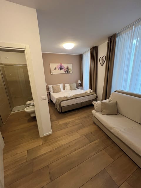 Family Room | In-room safe, desk, laptop workspace, iron/ironing board