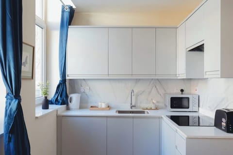 Apartment | Private kitchen | Fridge, microwave, stovetop, electric kettle