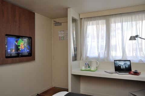 Premium bedding, desk, blackout drapes, iron/ironing board