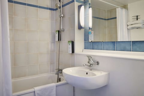 Combined shower/tub, eco-friendly toiletries, hair dryer, towels