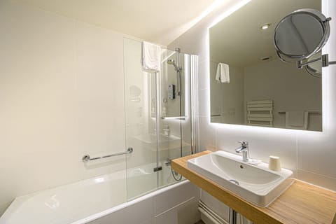 Eco-friendly toiletries, hair dryer, towels, shampoo