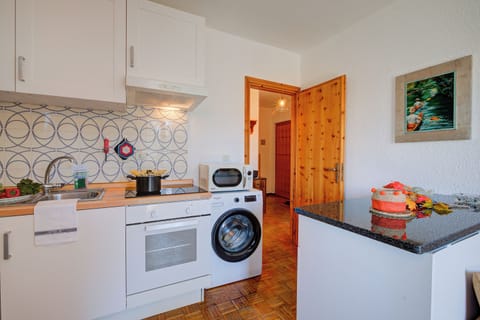 Standard Apartment, 1 Bedroom (Appartamento Il Rio) | Private kitchen | Fridge, microwave, stovetop, dishwasher