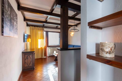 Apartment, 2 Bedrooms | Living area | TV, table tennis, books