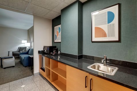 Desk, blackout drapes, iron/ironing board, free cribs/infant beds