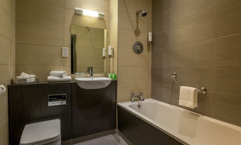 Combined shower/tub, eco-friendly toiletries, hair dryer, towels