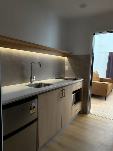 Deluxe Room | Private kitchen | Fridge, microwave, electric kettle, toaster