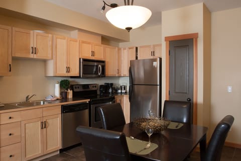 One-Bedroom Loft Suite | Private kitchen | Full-size fridge, microwave, oven, stovetop