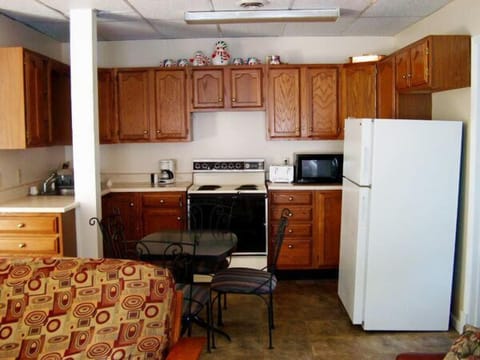 Two Bedroom Condo | Desk, blackout drapes, iron/ironing board, free WiFi