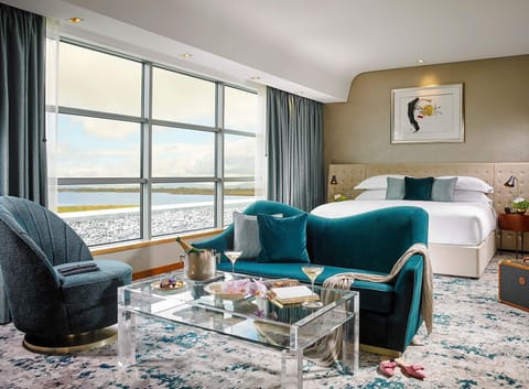 Junior Suite with View | Minibar, in-room safe, desk, blackout drapes