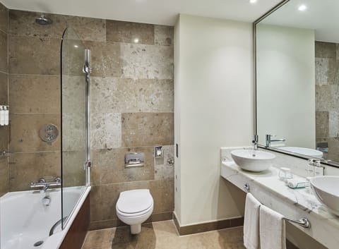 Combined shower/tub, bathrobes, slippers, towels