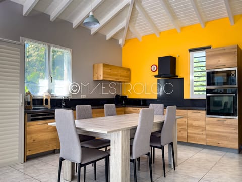 Comfort House, Balcony, Garden View | Private kitchen | Highchair