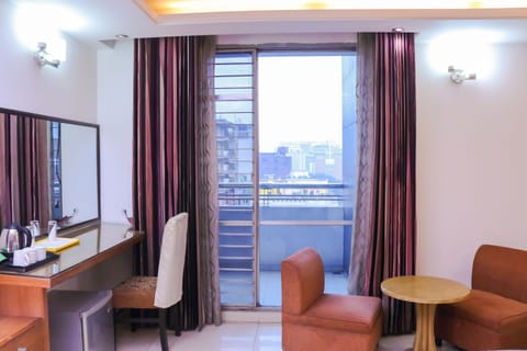 Premium Twin Room | Living area | LCD TV