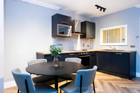 1 Bedroom Apartment | Private kitchen | Fridge, microwave, stovetop, dishwasher