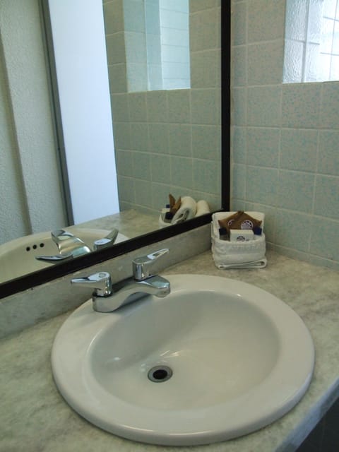 Standard Room, 2 Double Beds | Bathroom sink