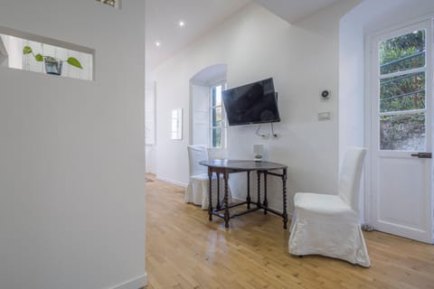 Apartment, Patio | Living area | 32-inch flat-screen TV with cable channels