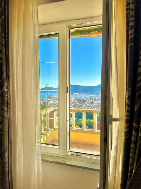 Deluxe Triple Room, Balcony, Sea View | Terrace/patio