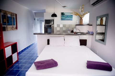 Economy Room | 1 bedroom, in-room safe, free WiFi, bed sheets