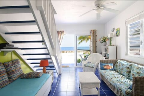 1 Bedroom Ocean Front Apartment | Living room | TV, DVD player