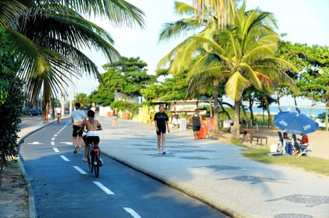 On the beach, white sand, sun loungers, beach umbrellas