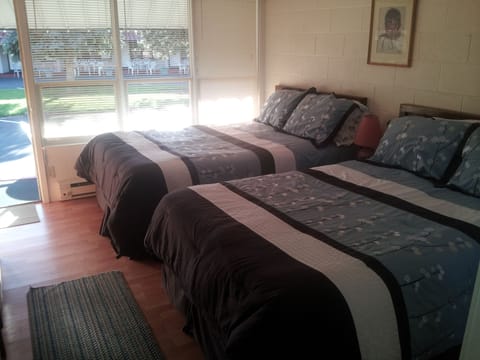 Standard Room, 2 Double Beds | Iron/ironing board, free WiFi, bed sheets