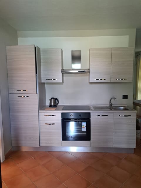 Superior Apartment, Pool View | Private kitchen | Highchair