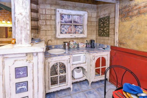 Villa, 1 King Bed, Balcony | Living area | 32-inch TV with satellite channels, fireplace, DVD player